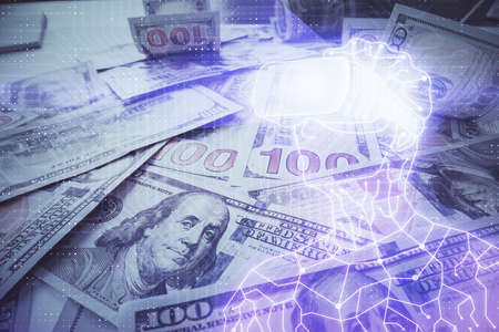 Double exposure of man wearing VR glasses drawing over usa dollars bill background. Concept of...