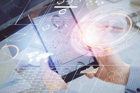 Multi exposure of man's hands holding and using a digital device and data theme drawing. Innovation...