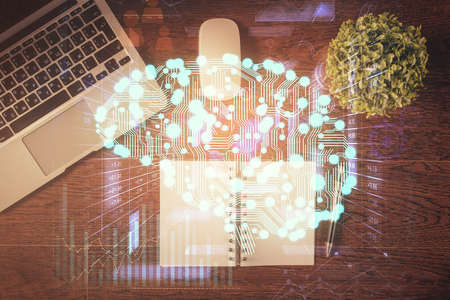 Double exposure of brain drawing hologram over topview work table background with computer. Concept of big data.の写真素材