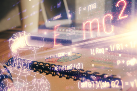 Double exposure of formula drawing and desk with open notebook background. Concept of education