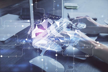 Multi exposure of woman hands working on computer and brain hologram drawing. Ai concept.の写真素材