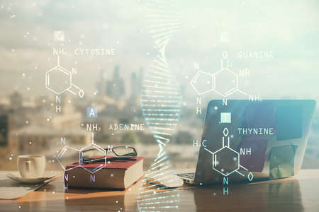 Double exposure of DNA drawing and desk with open notebook background. Concept of educationの写真素材