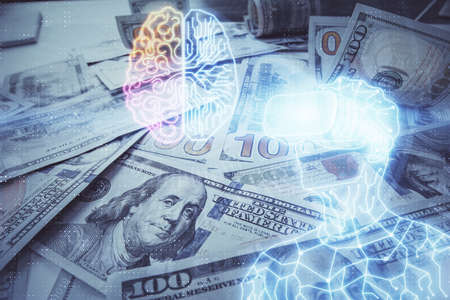 Double exposure of man wearing VR glasses drawing over usa dollars bill background. Concept of...