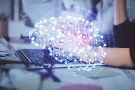 Multi exposure of woman hands working on computer and brain hologram drawing. Ai concept.