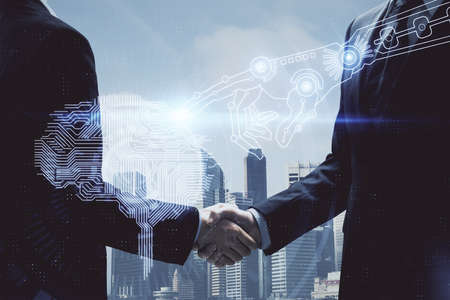 Double exposure of brain hologram and handshake of two men. Partnership in IT industry concept.