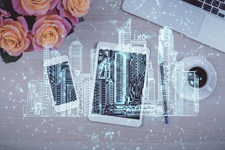 Multi exposure of smart city technology drawing over table with phone. Top view.の写真素材