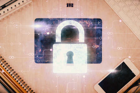 Double exposure of lock drawing over desktop. Top view. Security concept.