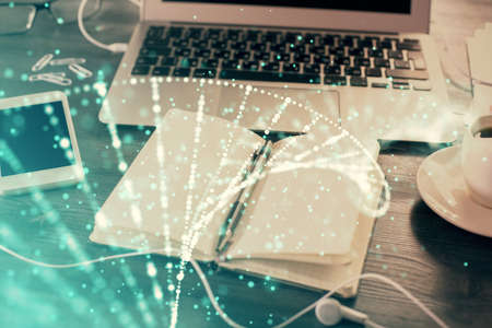 Double exposure of DNA drawing and desk with open notebook background. Concept of educationの写真素材