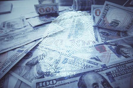Double exposure of finger print scan drawing over usa dollars bill background. Concept of security of safe access.の写真素材