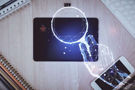 Multi exposure of creative drawing over table with phone. Top view. Concept of startup.