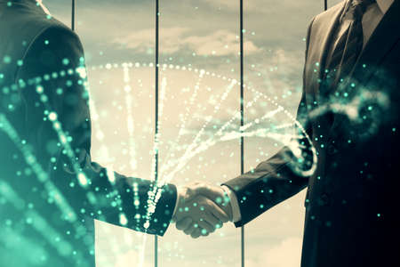 Double exposure of DNA hologram and handshake of two men. Medical Education