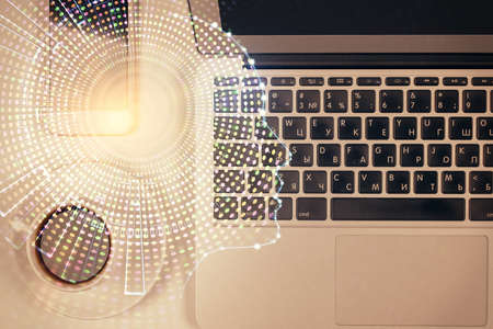 Double exposure of brain drawing hologram over topview work table background with computer. Concept of big data.の写真素材