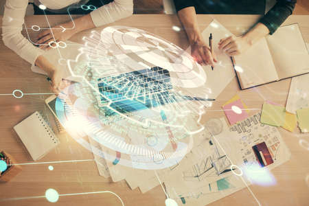 Double exposure of woman hands working on computer and data theme hologram drawing. Top View....