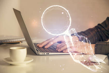 Double exposure of woman hands typing on computer and creative drawing. Start up concept.