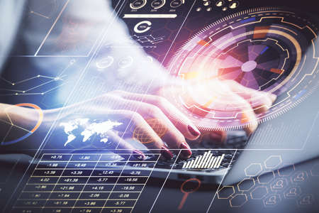Multi exposure of woman hands working on computer and data theme hologram drawing. Tech concept.