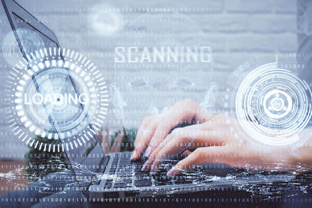 Double exposure of woman hands working on computer and data theme hologram drawing. Tech concept.