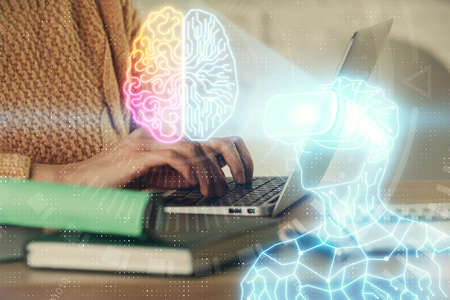 Double exposure of woman hands typing on computer and man in AR glasses drawing. Education concept.