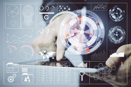 Multi exposure of man's hand holding and using a digital device and data theme drawing. Innovation...