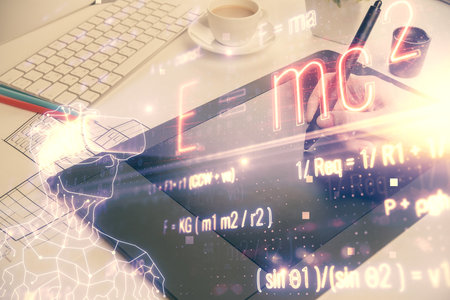 Double exposure of formulas sketch hologram and woman holding and using a mobile device. Education concept.の写真素材