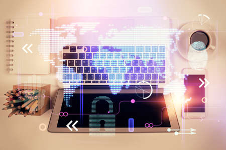 Double exposure of map hologram drawing over study table background with computer. Concept of...