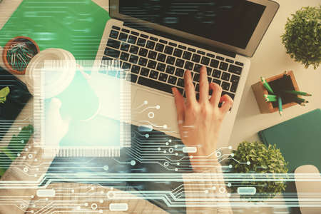 Double exposure of woman hands working on computer and data theme hologram drawing. Top View....