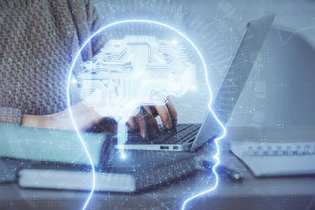 Multi exposure of woman hands working on computer and brain hologram drawing. Ai concept.の写真素材