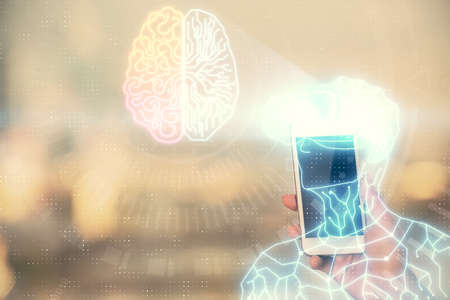 Double exposure of man in vr glasses sketch hologram and woman holding and using a mobile device.の写真素材