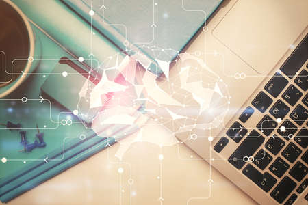 Multi exposure of brain sketch hologram over topview work table background with computer. Concept of...