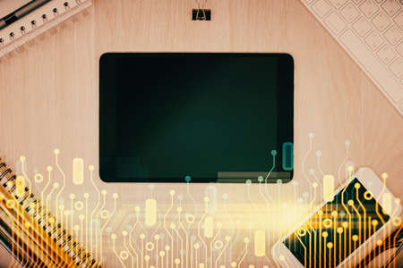 Multi exposure of technology theme drawing over work table desktop. Top view. Global data analysis...