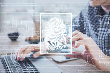 Double exposure of man hands holding a credit card and fingerprint drawing. Security in E-commerce...