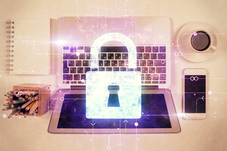 Double exposure of lock hologram drawing over study table background with computer. Concept of data...