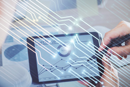 Multi exposure of man's hands holding and using a digital device and data theme drawing. Innovation concept.の写真素材