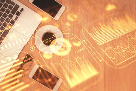 Multi exposure of technology theme drawing over table with phone. Top view. Concept of hightech.の写真素材