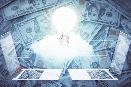 Double exposure of light bulb drawing over usa dollars bill background. Concept of idea.の写真素材