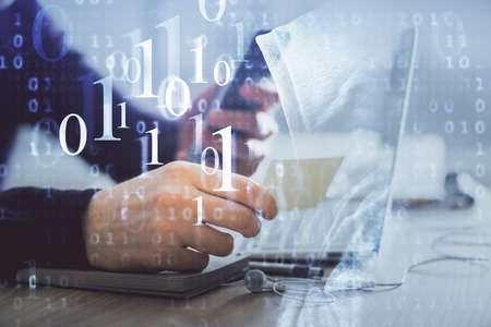 Multi exposure of man's hands holding and using a digital device and data theme drawing. Innovation...