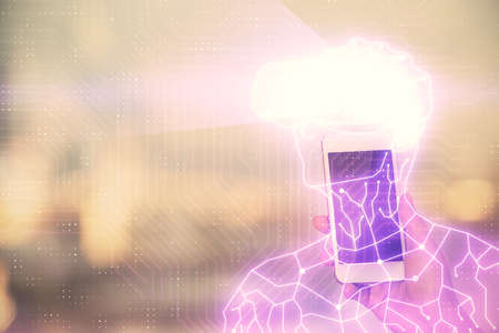 Double exposure of man in vr glasses sketch hologram and woman holding and using a mobile device.