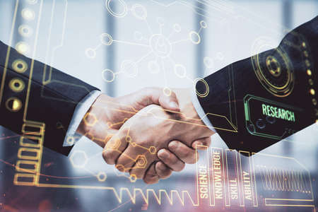 Double exposure of data theme hologram and handshake of two men. Partnership in IT industry concept.