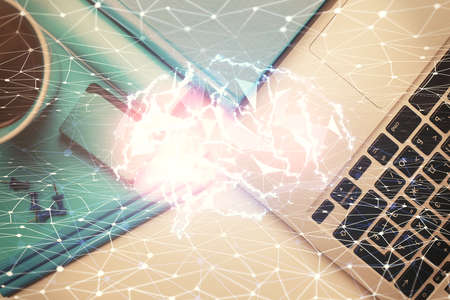 Multi exposure of brain sketch hologram over topview work table background with computer. Concept of...
