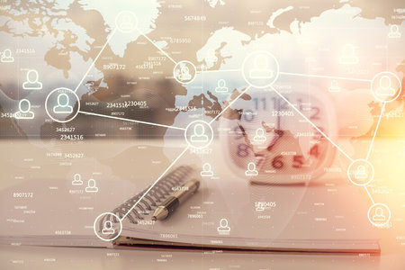Double exposure of social network theme drawings and desk with open notebook background. Concept of people connectionの写真素材