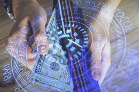 Double exposure of technology drawing hologram and us dollars bills and man hands. Data conceptの写真素材