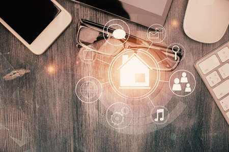 Multi exposure of smart city technology drawing over table with phone. Top view.の写真素材