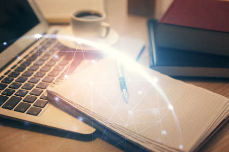 Double exposure of social network drawing and desktop with coffee and items on table background. Concept of international connection.の写真素材