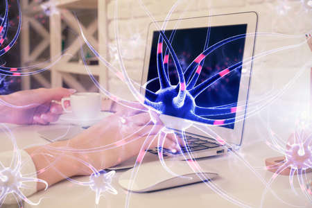 Double exposure of woman hands typing on computer and neuron drawing. Education concept.の写真素材