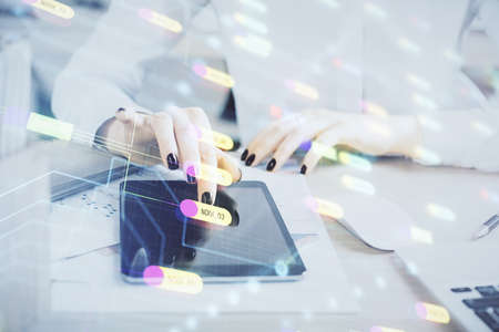 Double exposure of technology sketch hologram and woman holding and using a mobile device. Ai conceptの写真素材