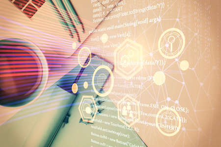 Multi exposure of data drawing hologram over topview of study desk background with computer. Concept of technology.の写真素材
