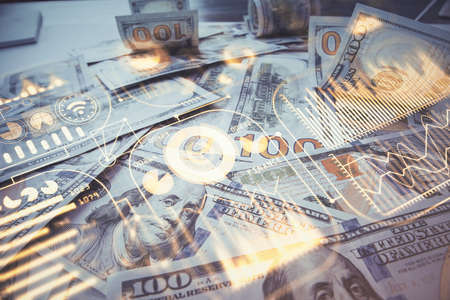 Double exposure of tech theme drawing over usa dollars bill background. Concept of technology.の写真素材