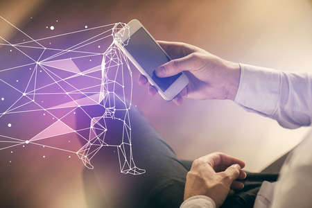 Double exposure of man's hands holding and using a mobile device and creative hologram drawing.の写真素材