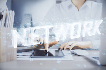 Double exposure of technology sketch hologram and woman holding and using a mobile device. Ai conceptの写真素材