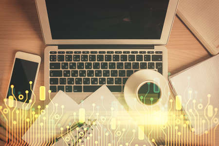 Multi exposure of data theme drawing hologram over topview work desk background with computer....