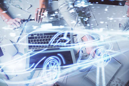 Double exposure of man and woman working together and a car hologram drawing. Autopilot concept....